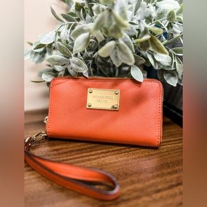 Kate spade orange wrist wallet